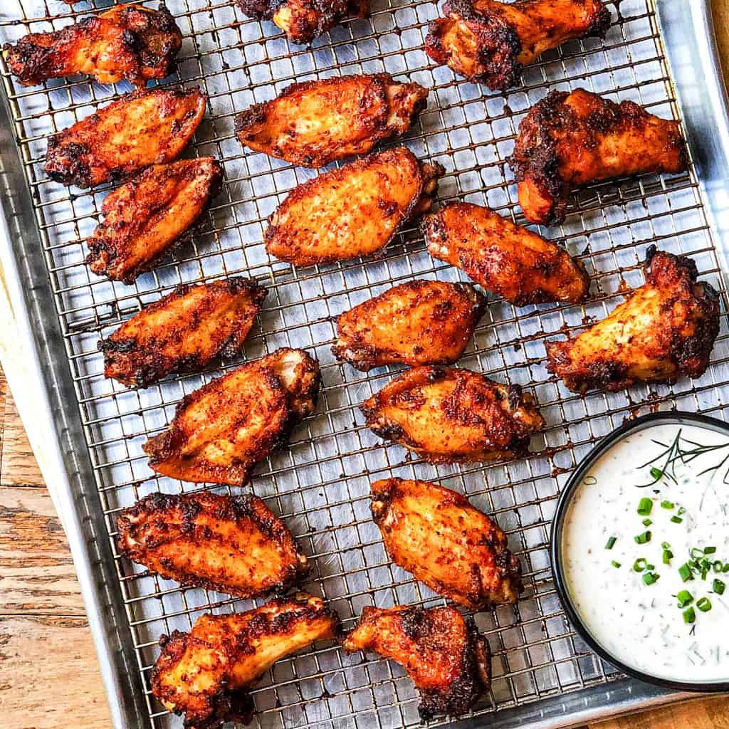 Sheet pan with Sweet and Smoky Dry Rub Wings and Ranch Dressing