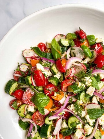 Greek Salad with Herb Marinated Feta on a large saLAD PLATTER