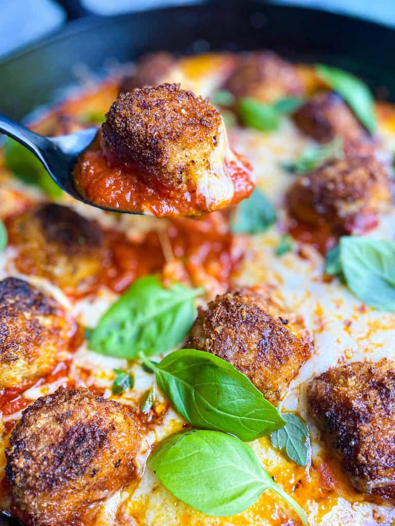 Chicken Parmesan Meatballs in marinara ooze with mozzarella cheese and flavor.