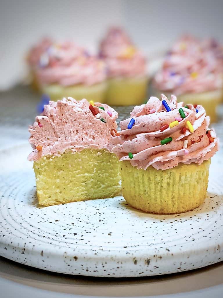 Cut view of Vanilla Cupcakes with Strawberry Buttercream