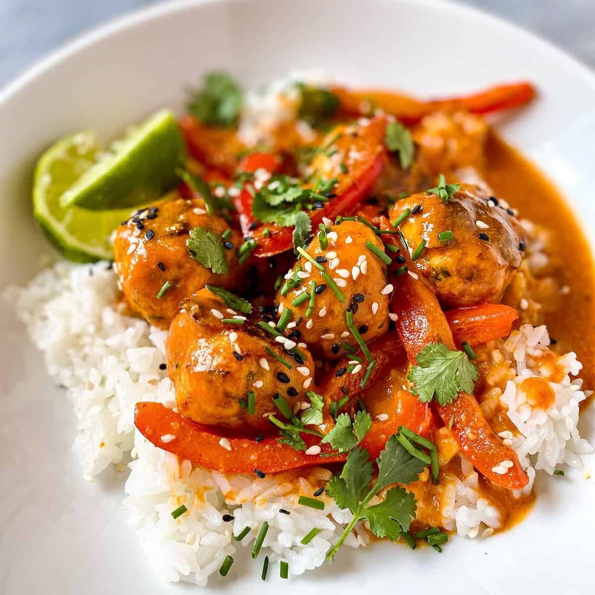 Thai Chicken Meatballs with Red Curry Peanut Sauce