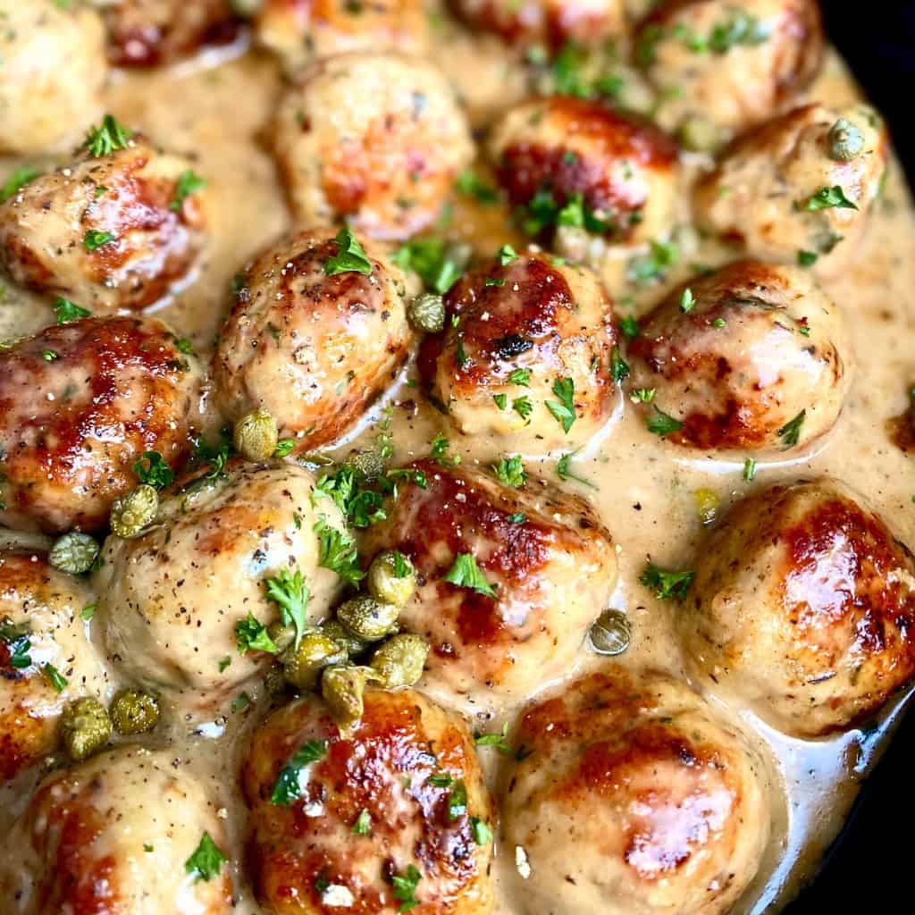 Chicken meatballs in a lemon cream sauce.