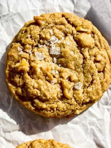 Peanut Butter White Chocolate Oatmeal Cookies on crinkly white parchment paper