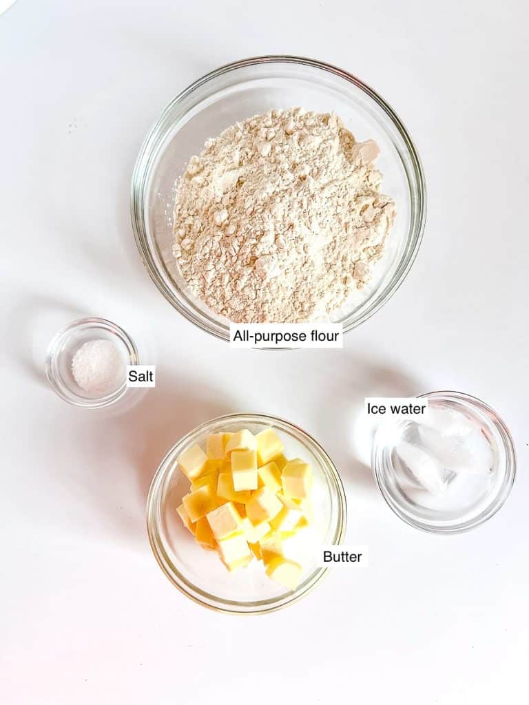 Ingredients for puff pastry; flour, salt, butter, and ice water.