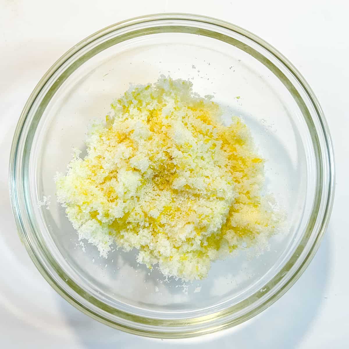 Lemon sugar in a glass bowl.