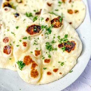 Garlic Butter Naan on a platter.