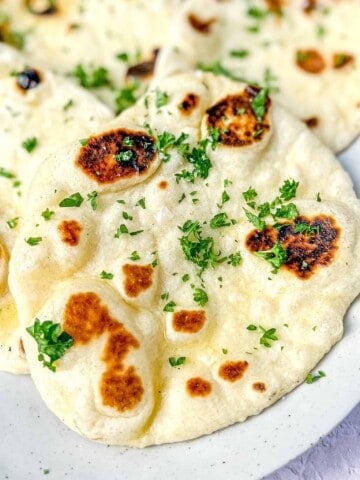 Garlic Butter Naan on a platter.