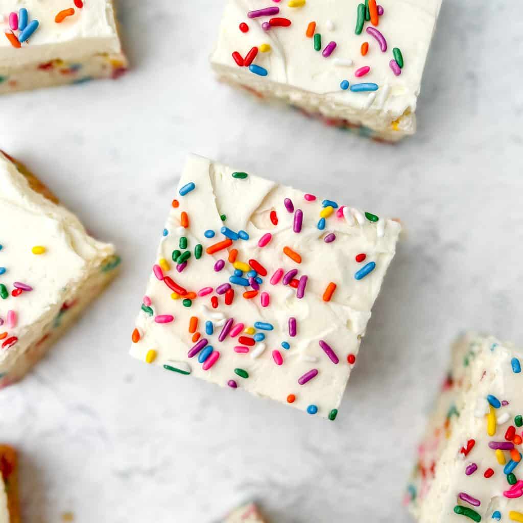 Cut frosted sugar cookie bars.