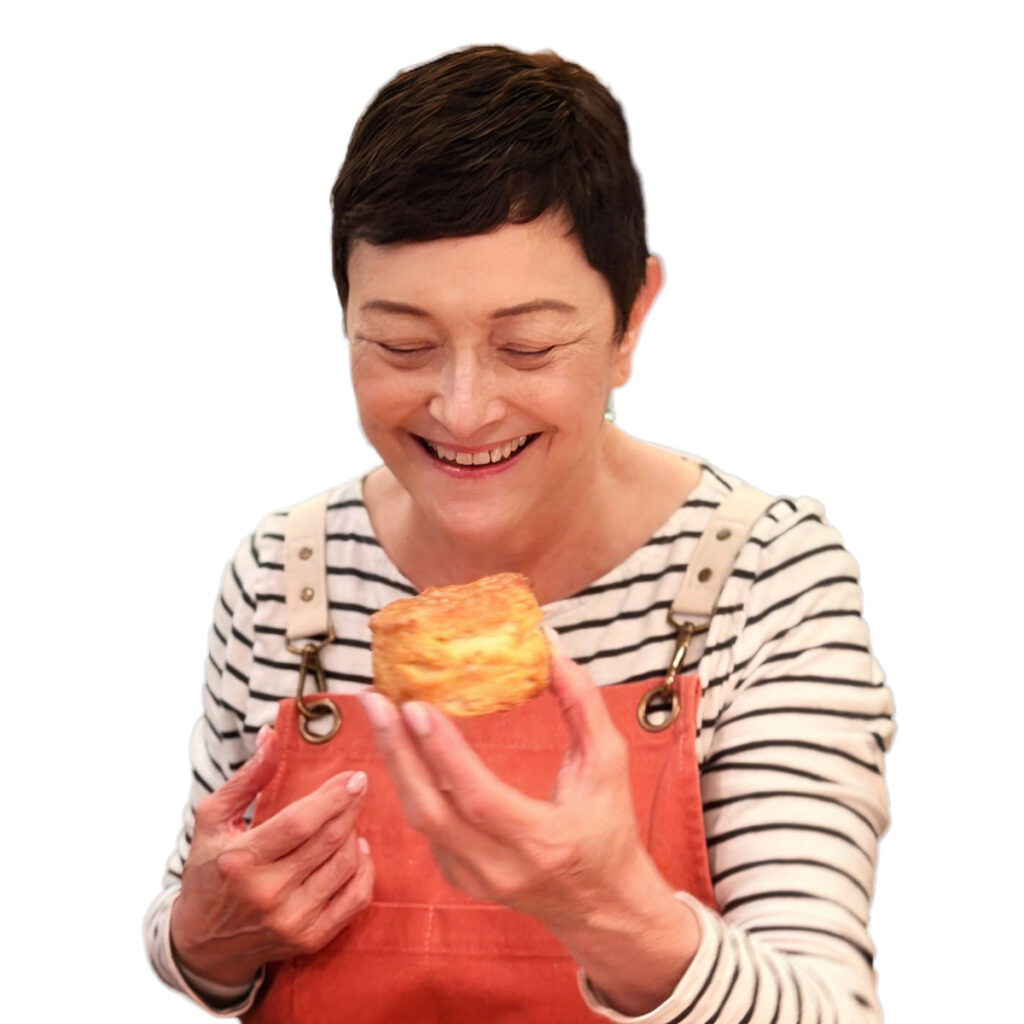 Picture of the author staring at a biscuit.