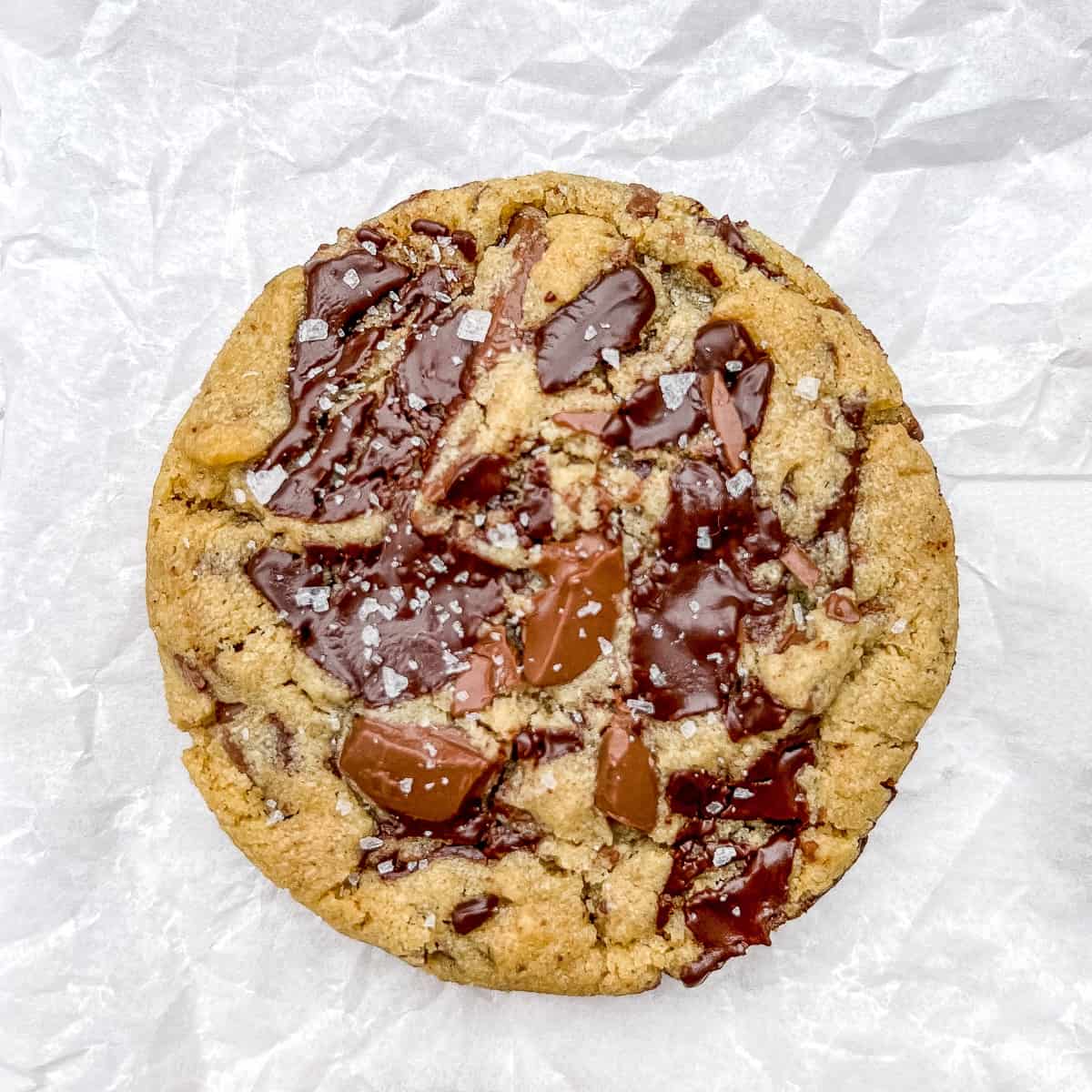chocolate chip cookie on parchment paper