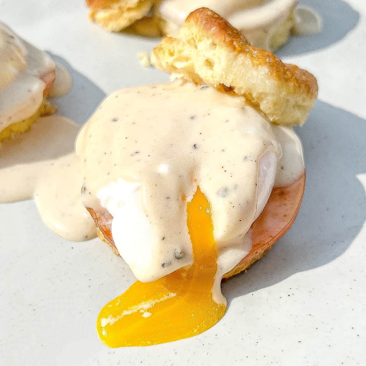 biscuit eggs benedict with a runny yolk.