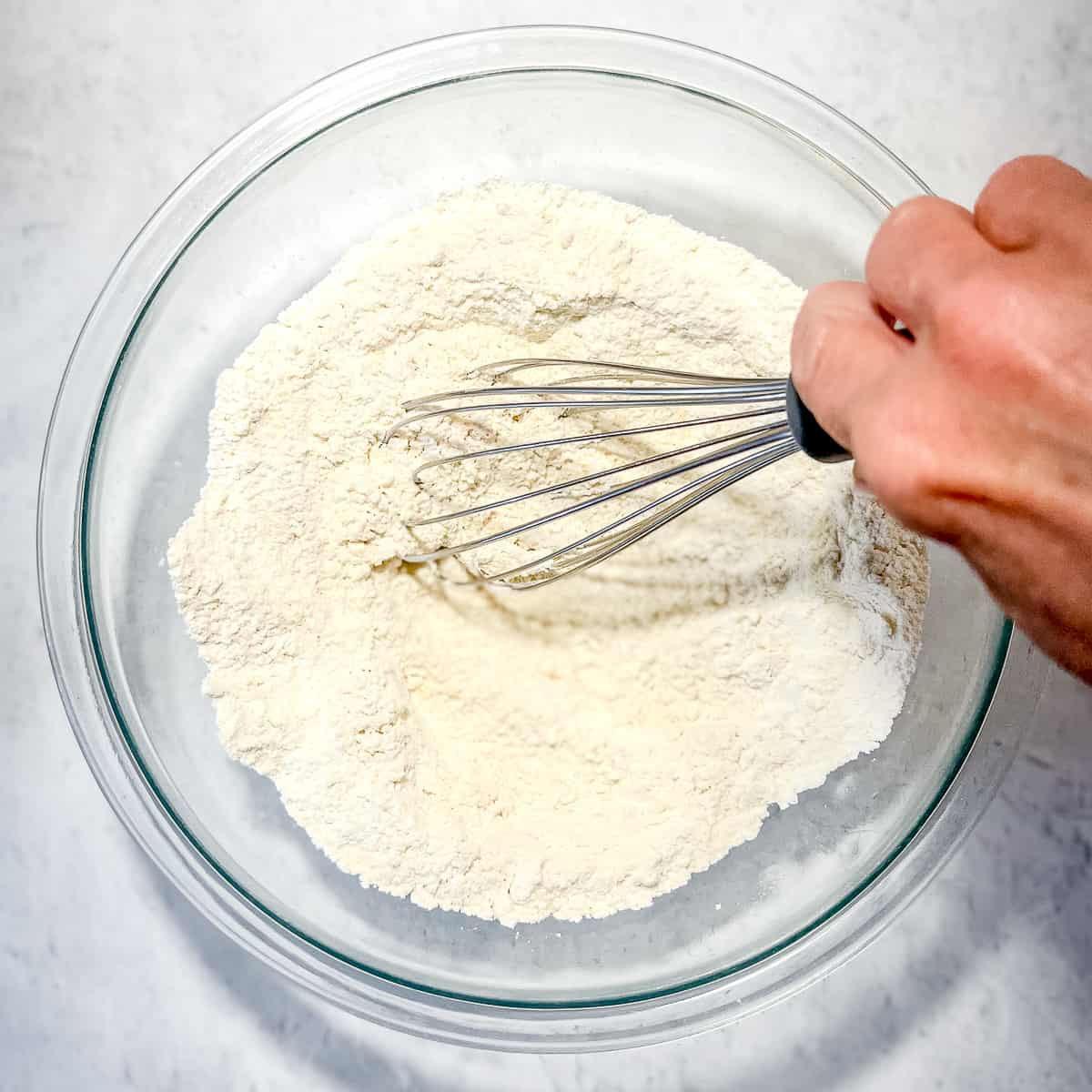 whisking dry ingredients together