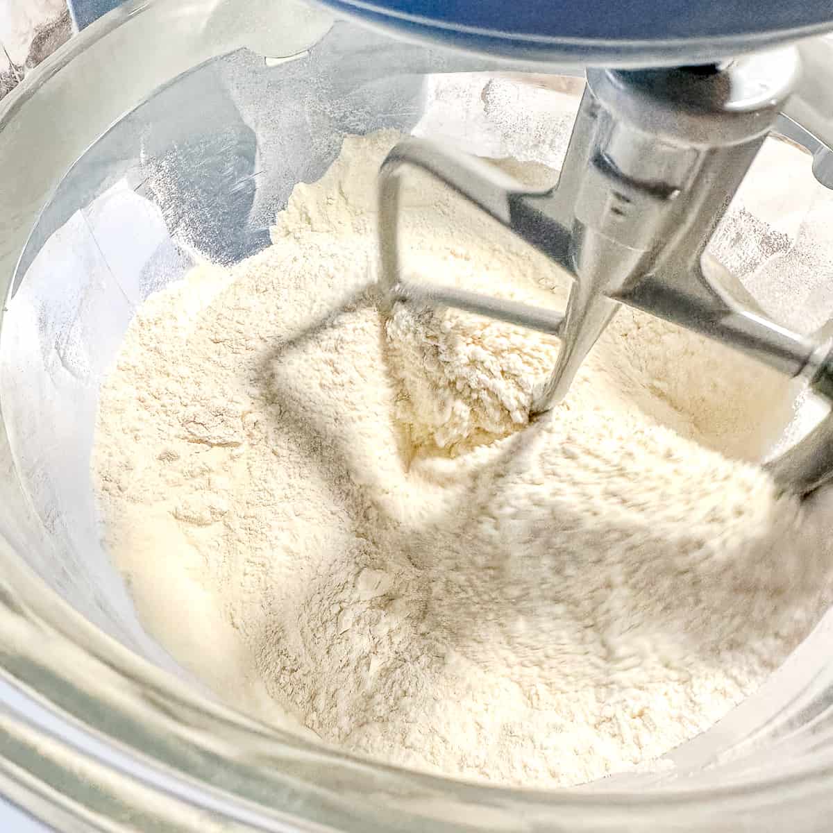 mixing dry ingredients in a stand mixer.
