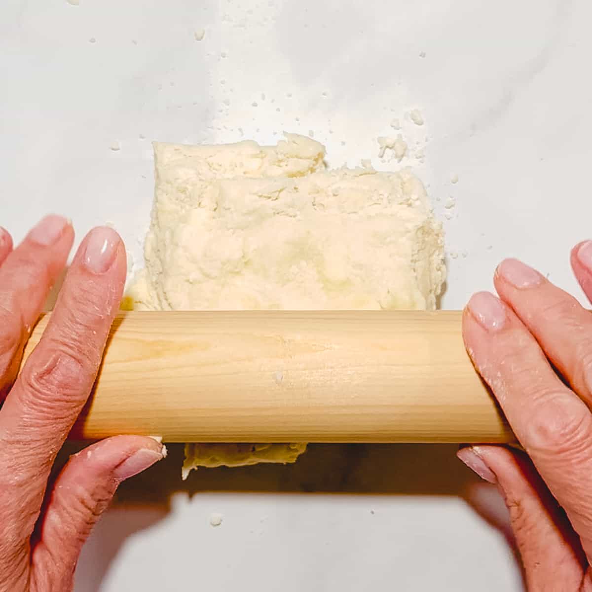 rolling out a small batch of biscuit dough.