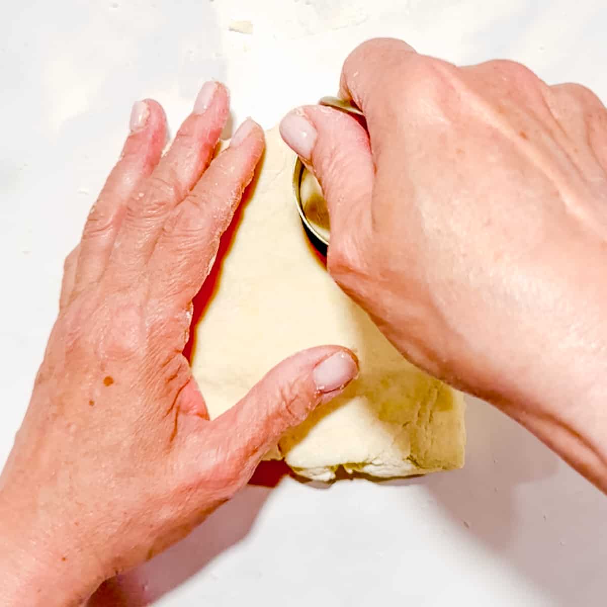 cutting out a biscuit.