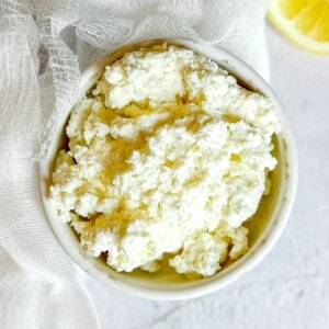 homemade ricotta cheese in a bowl.