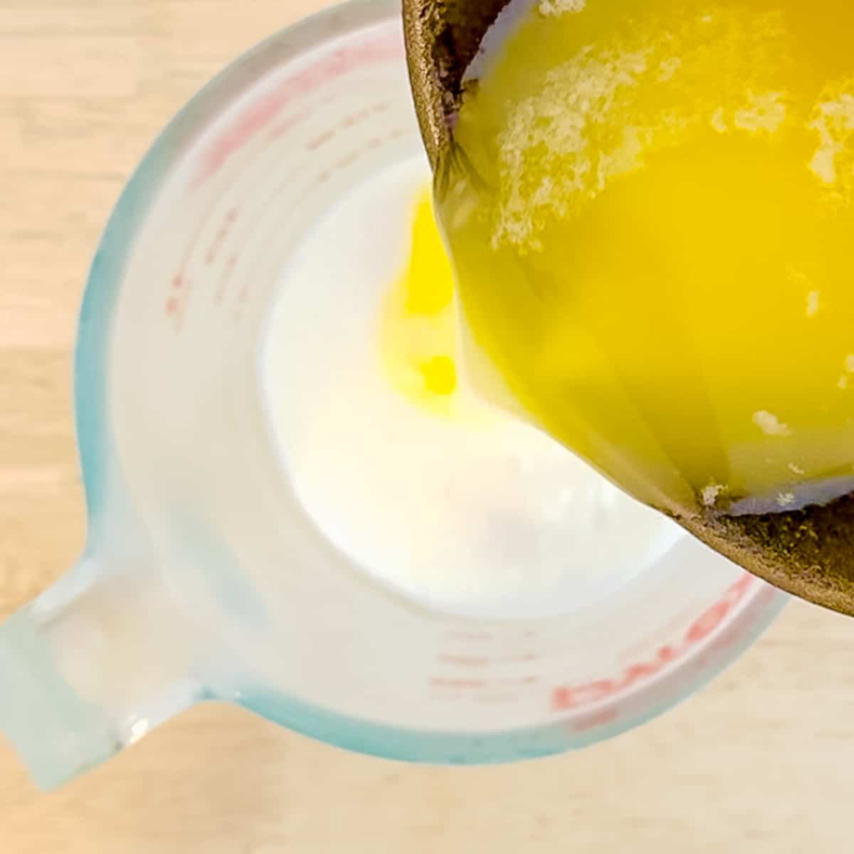 adding melted butter into very cold buttermilk.