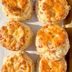 ham and swiss biscuits on sheet tray.