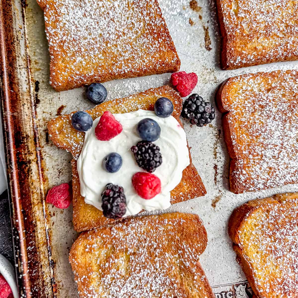 sheet pan french toast with yogurt and fruit.