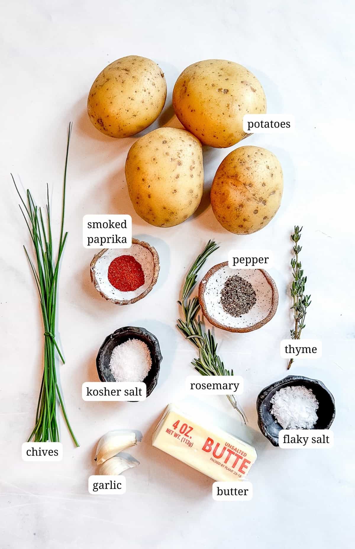 Labeled picture of ingredients to make crispy accordion potatoes.