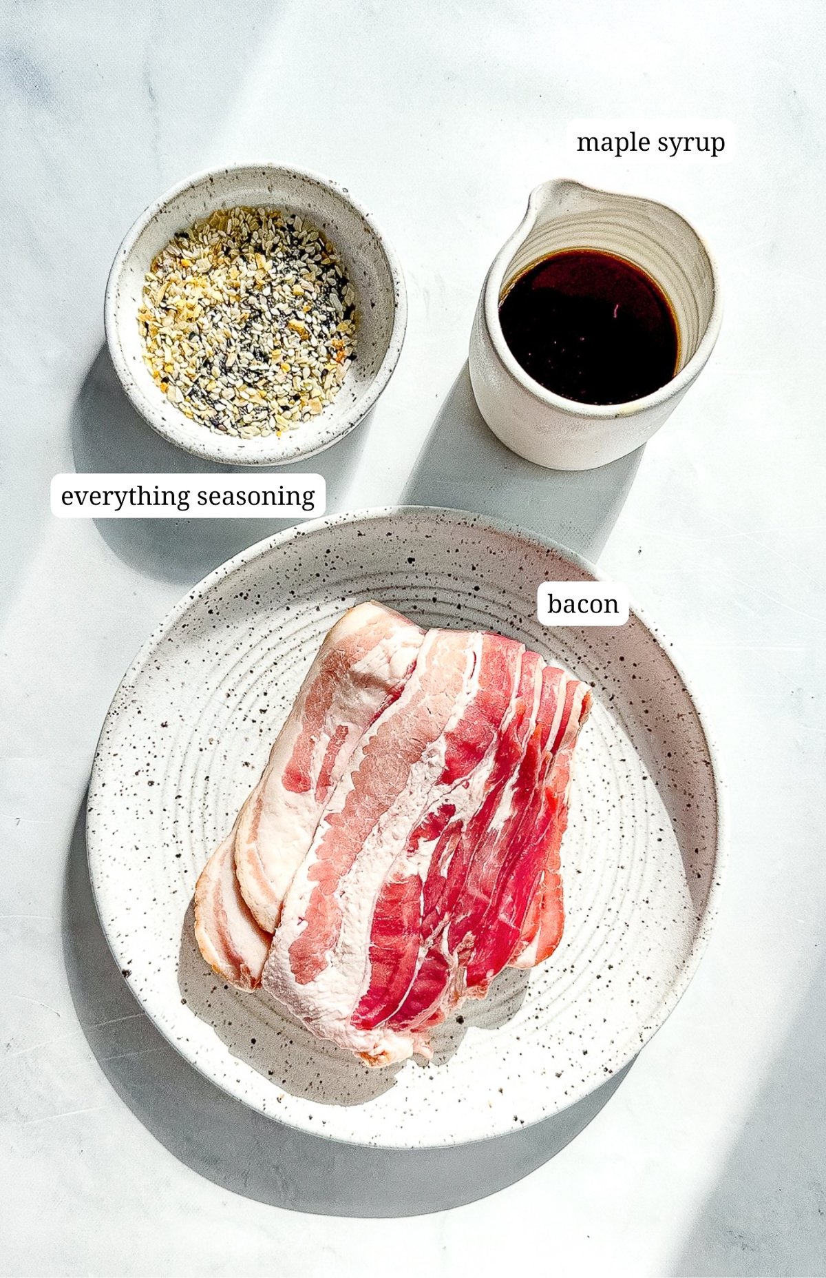 Labeled photo of ingredients to make everything seasoned bacon.