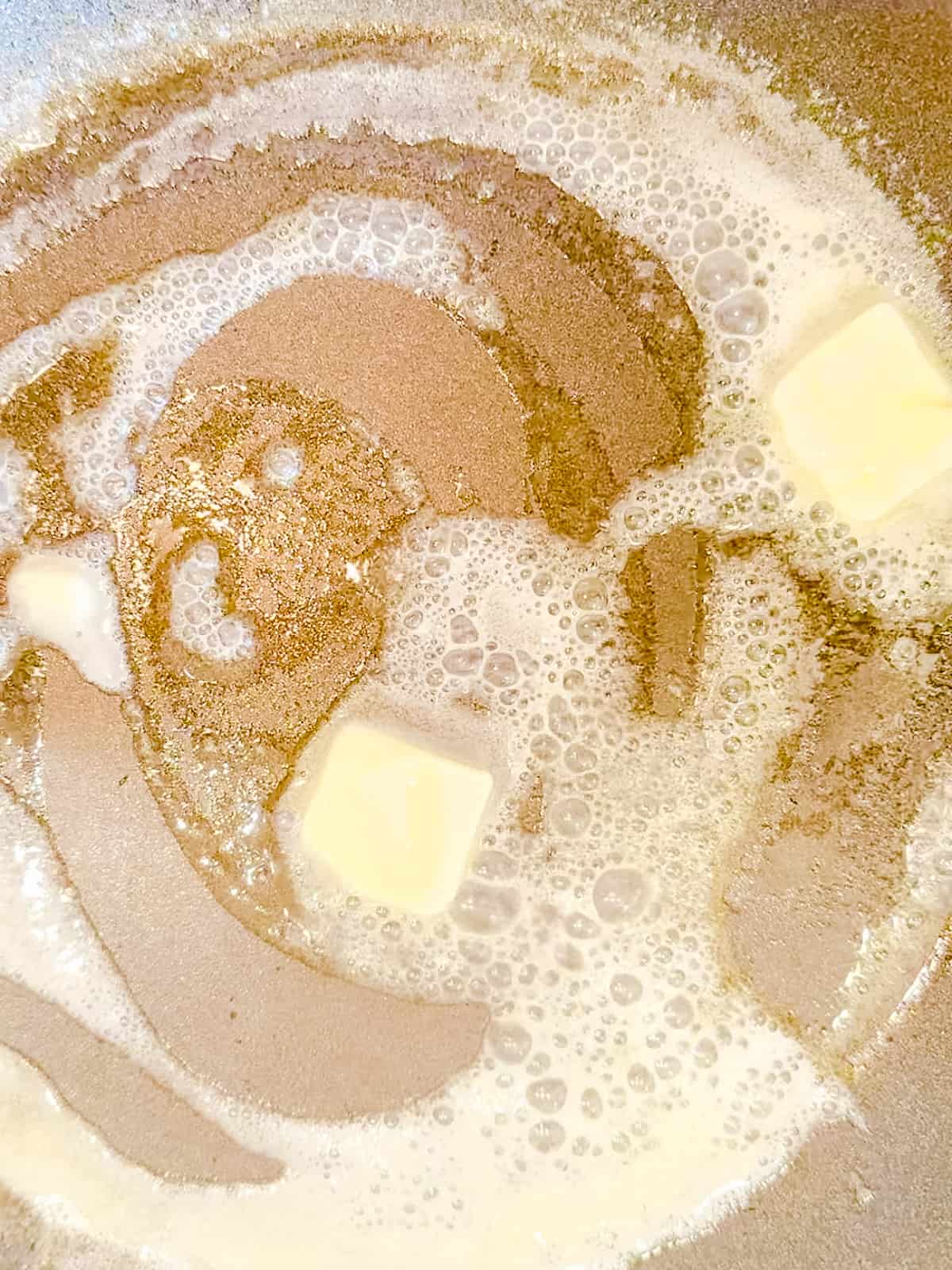 Melting butter in a nonstick pan.