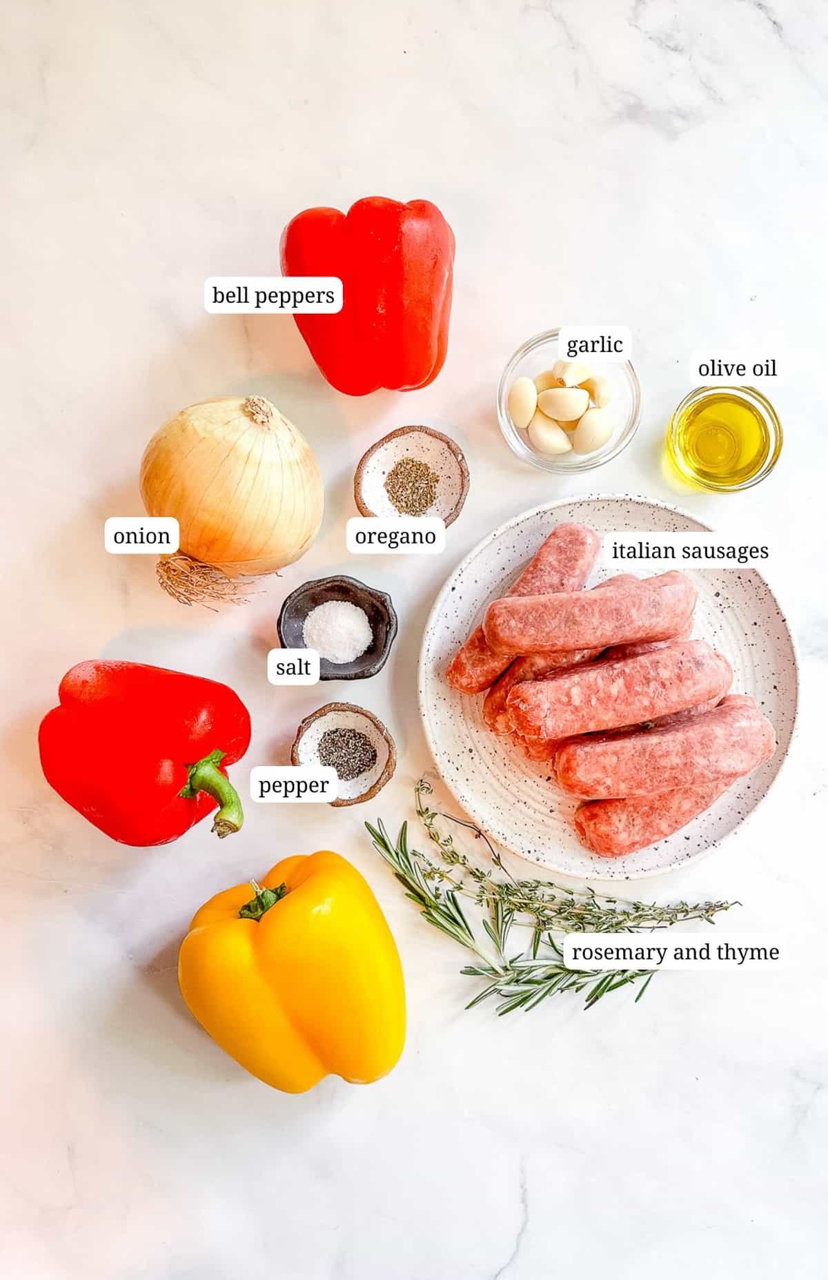 Labeled image of ingredients to make sheet pan sausage and peppers.