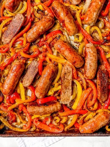 Sausage and peppers on a sheet pan.