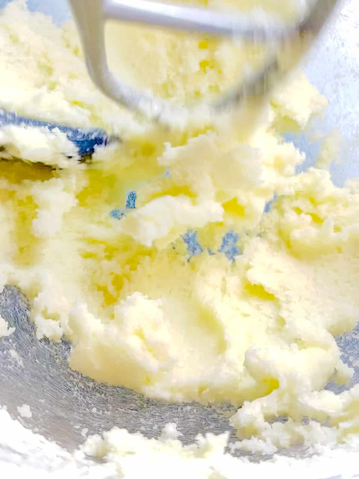 Creaming butter and sugar in a stand mixer.