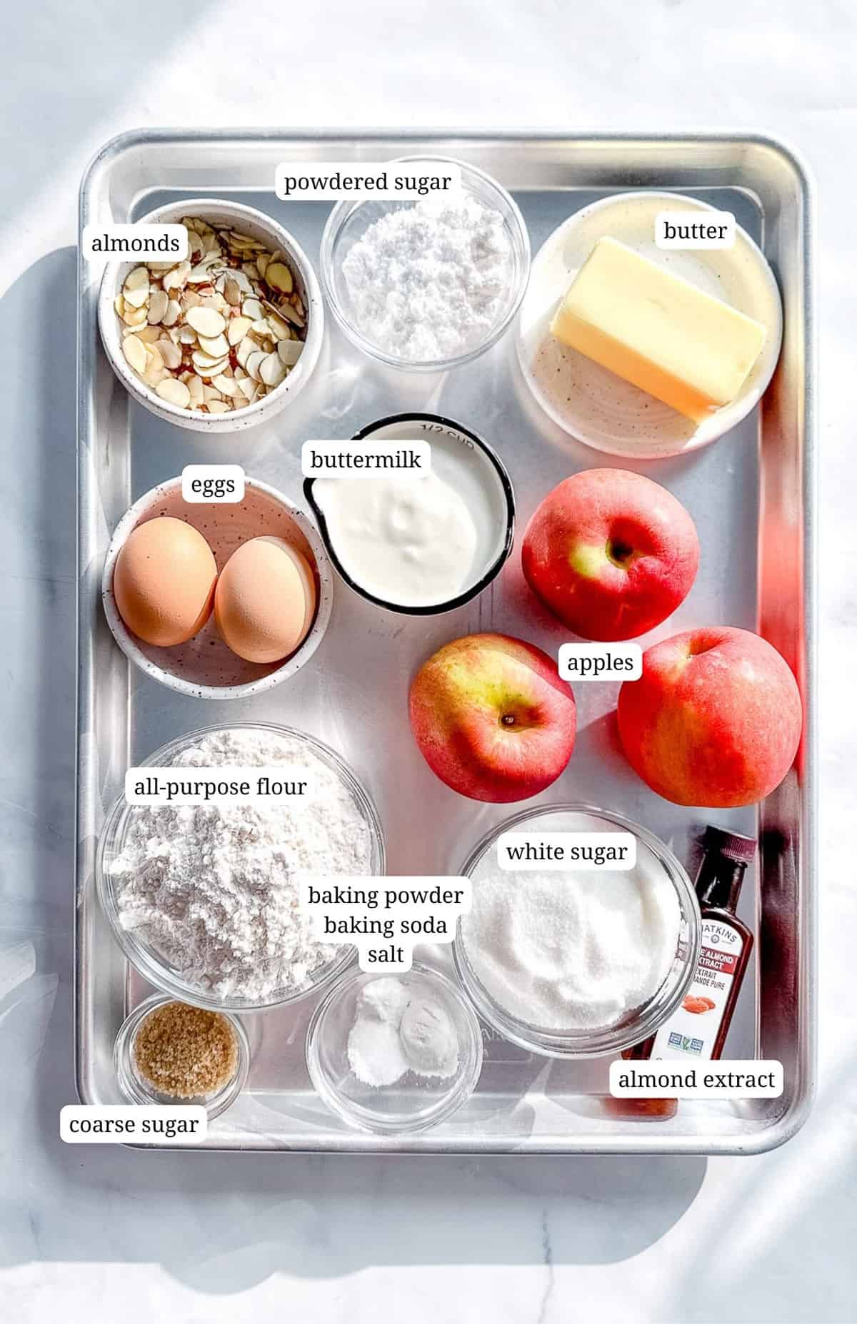 Labeled image of ingredients to make apple cake.