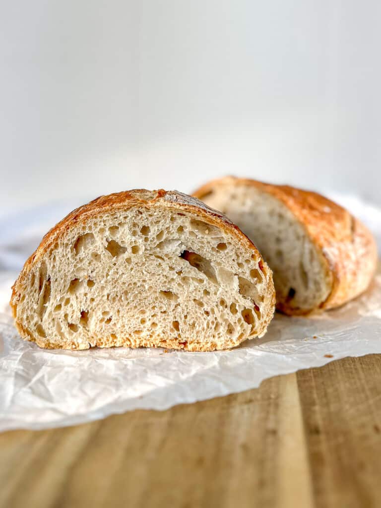 A loaf of no knead bread, sliced open.