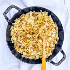 Cast iron pan of southern fried cabbage.