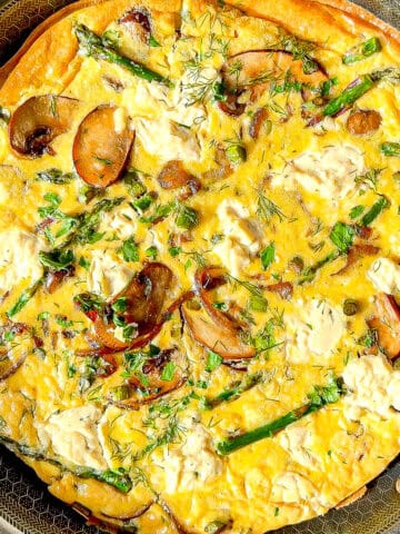 Spring asparagus frittata in a skillet.