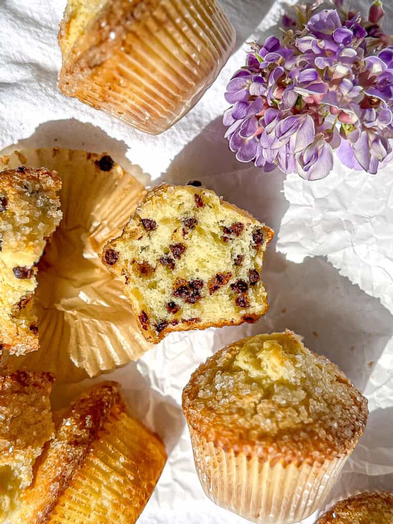 Chocolate chip buttermilk muffin on a white background.