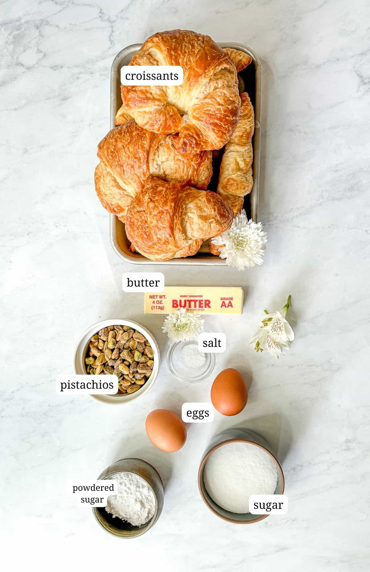 Labeled image of ingredients to make pistachio filled croissants.