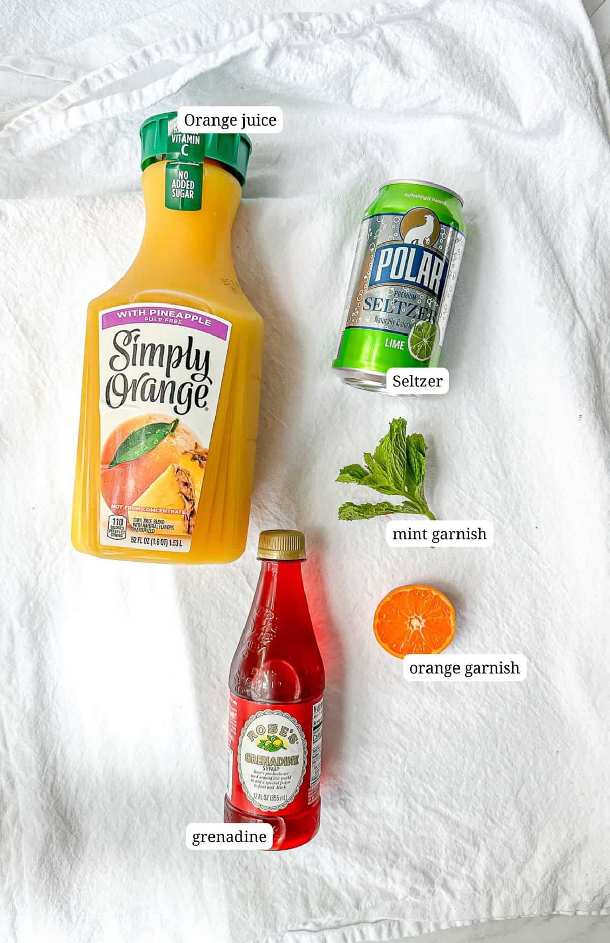 Labeled image of ingredients needed to make a sunrise mocktail.