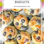 Pinterest image of glazed blueberry biscuits.