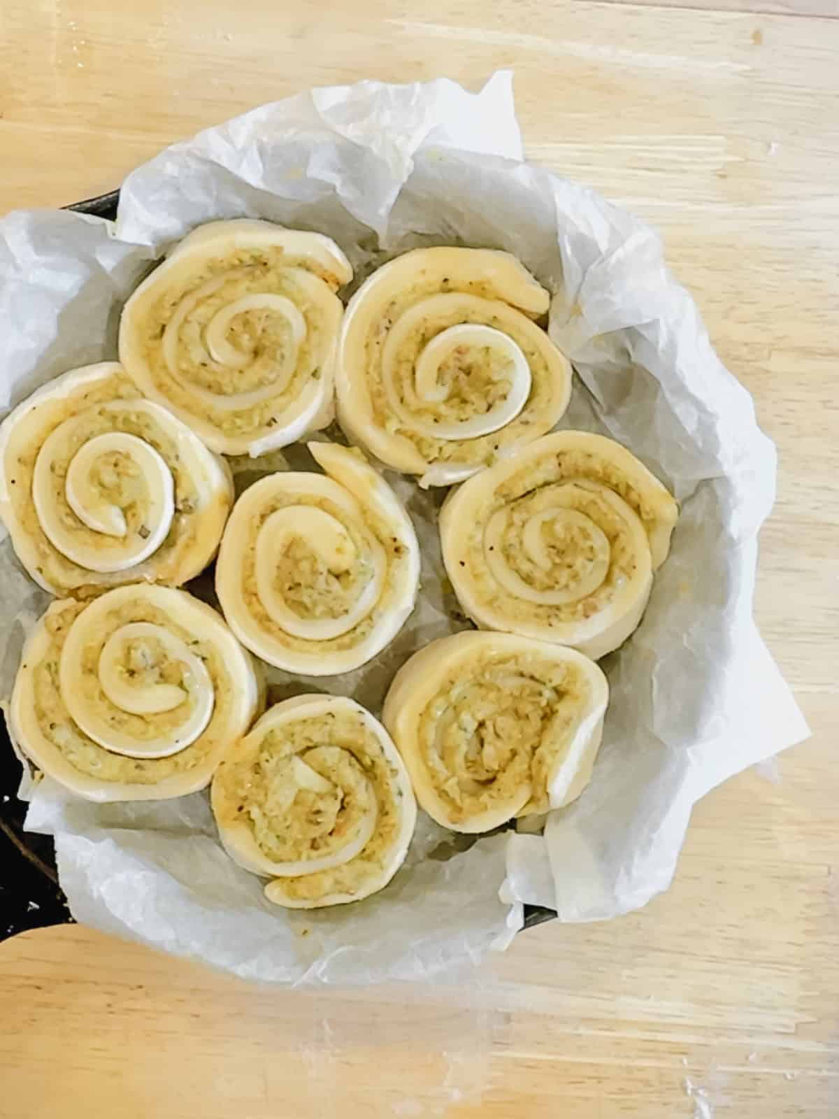 Assembled pistachio rolls, ready to rise overnight in the refrigerator.