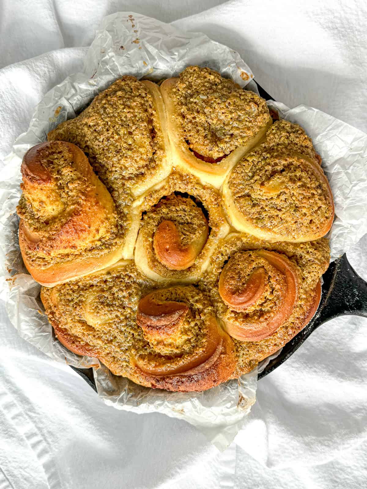 Baked pistachio rolls before icing.