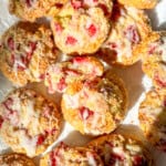A pile of strawberry muffin tops.