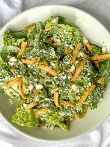 Mexican Caesar salad in a white bowl.