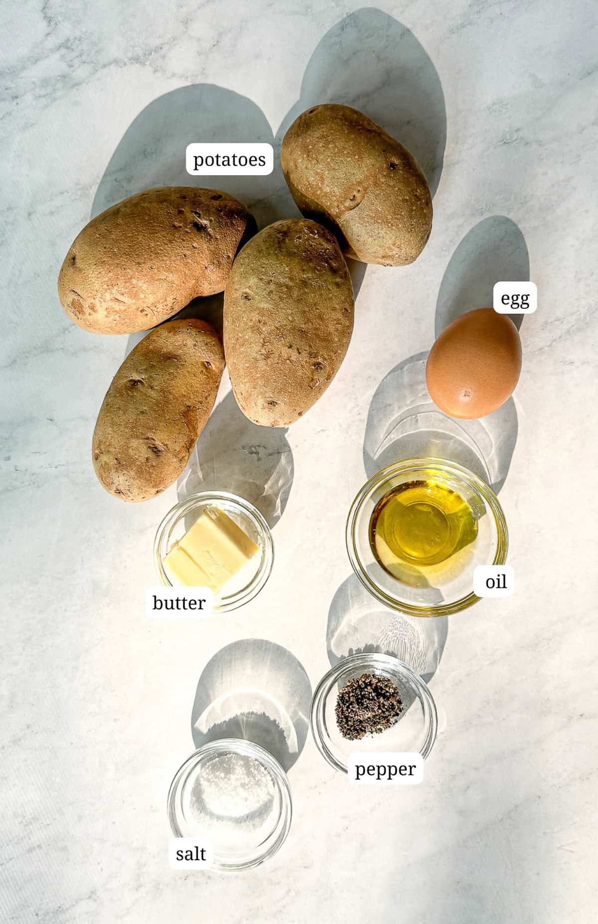 Labeled image of ingredients to make homemade hash brown patties.