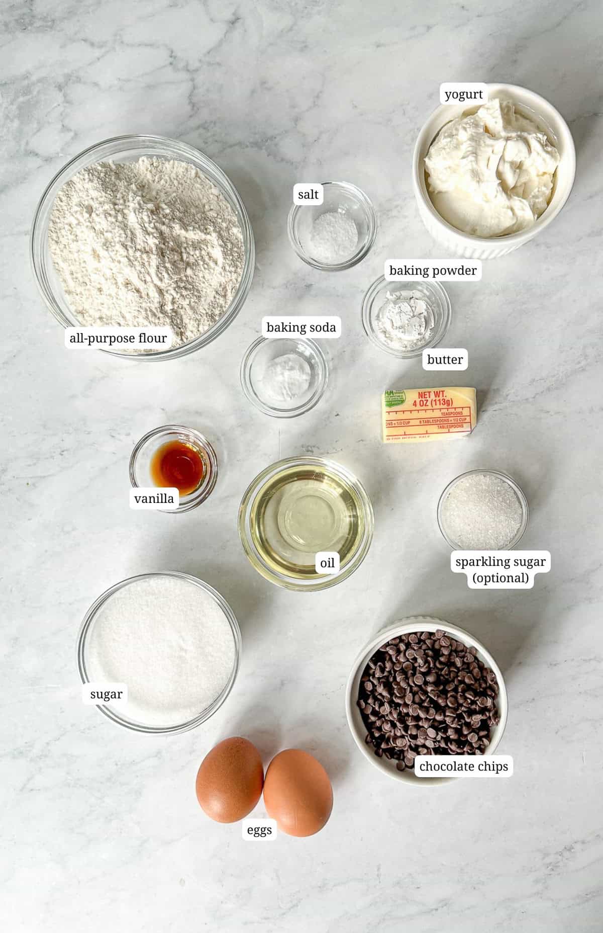 Pinterest image of ingredients needed to make easy chocolate chip yogurt muffins.