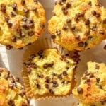 Chocolate chip muffins on a white background.