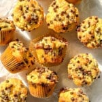 Chocolate chip muffins on a white background.