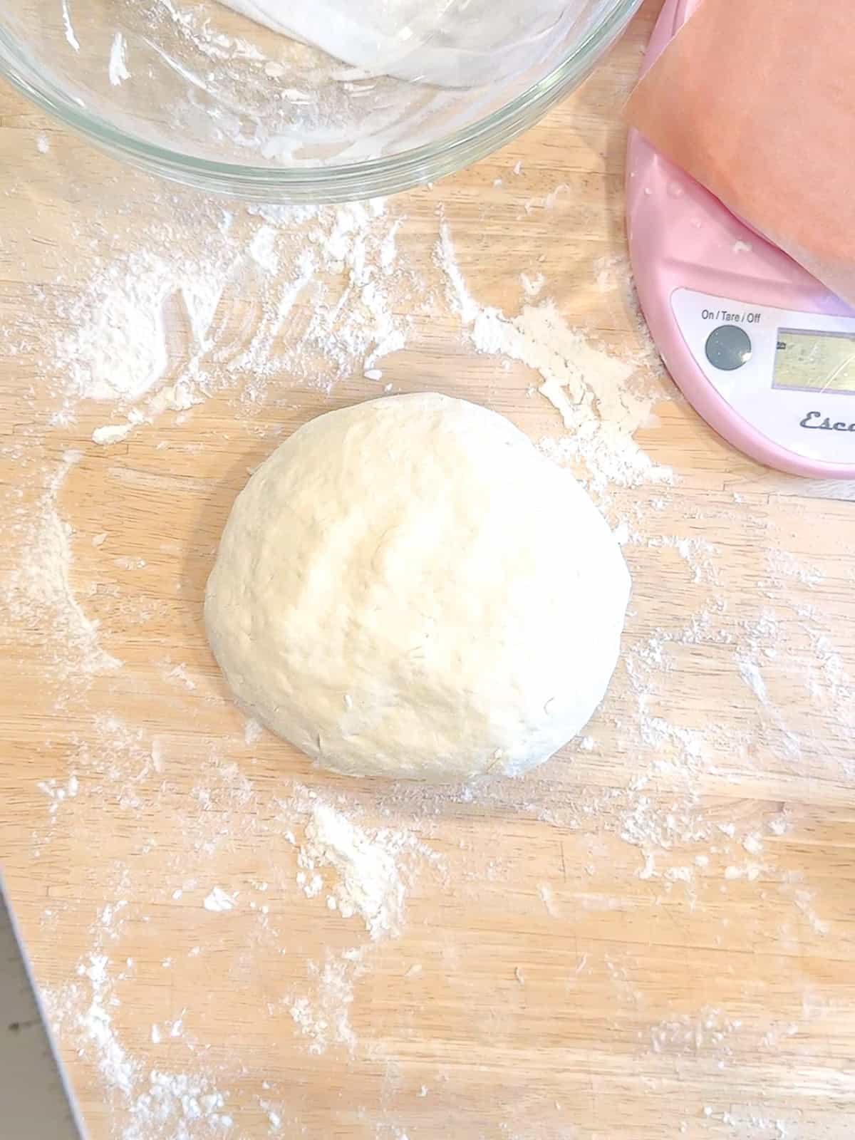 Two ingredient dough on a lightly floured counter.