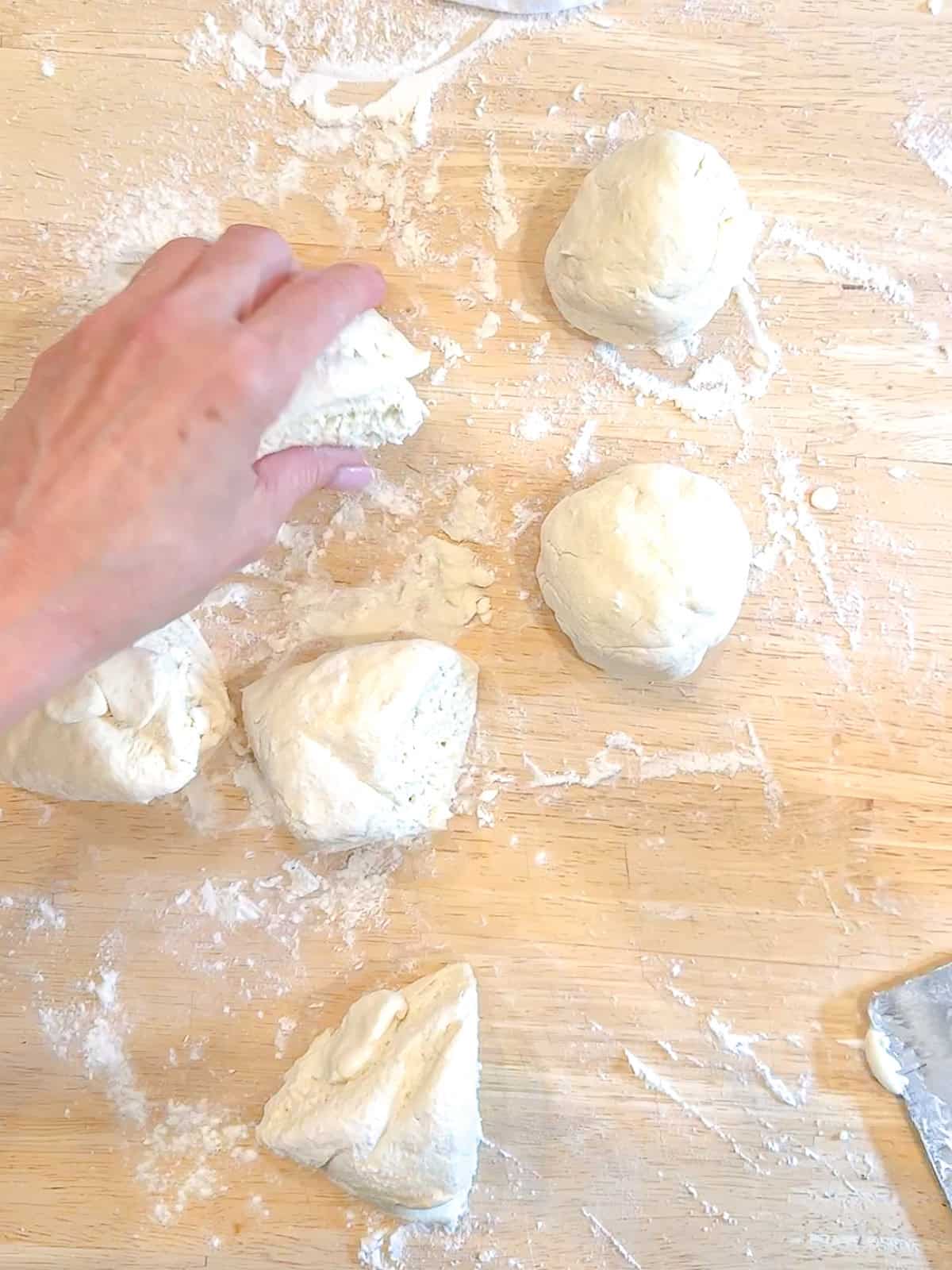 Dividing flatbread dough into equal pieces.