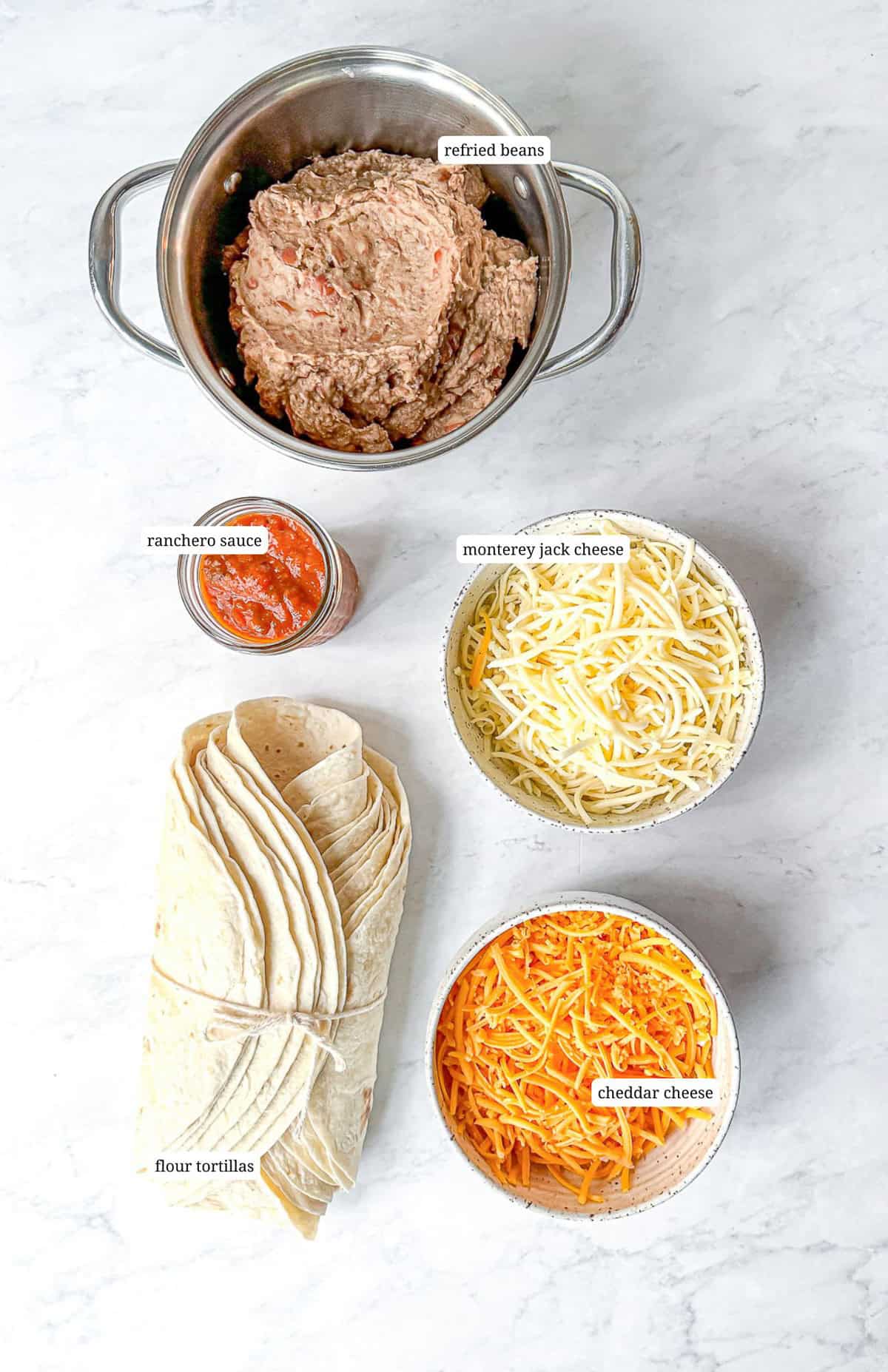 Ingredients to make bean and cheese burritos.