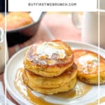 Pinterest image of southern hoecakes on a white plate with maple syrup.