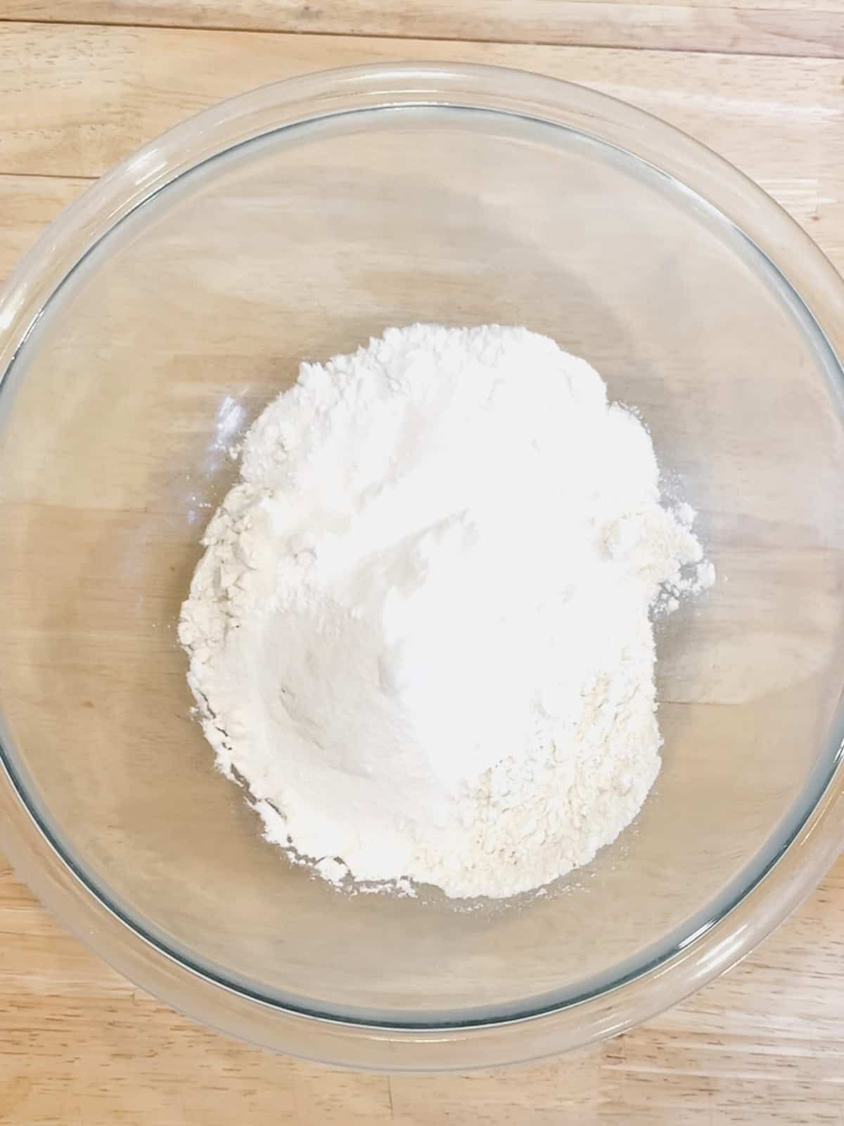 Dry ingredients in a glass bowl.